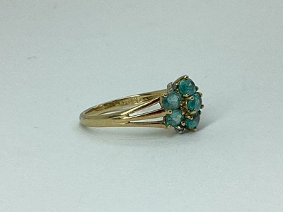Lot 56 - QVC; A 9ct Gold Claw Set Cluster Ring, the...
