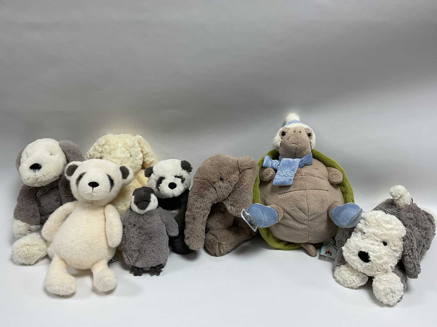 Lot 310 - Eight Jellycat soft toys, including "Timmy...