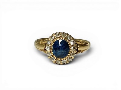 Lot 176 - An Antique Oval Sapphire and Diamond Cluster...