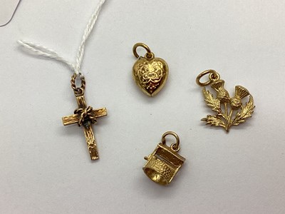 Lot 171 - A Textured 9ct Gold Cross Charm, together with...