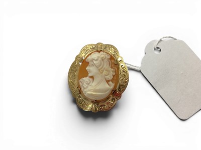 Lot 152 - A Shell Carved Cameo Brooch, the oval panel...