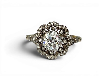 Lot 197 - A Large Single Stone Diamond Ring, the central...