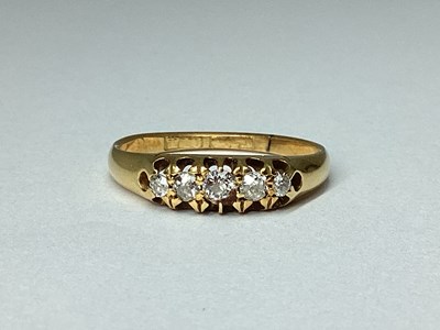 Lot 179 - A Graduated Five Stone Old Cut Diamond Ring,...