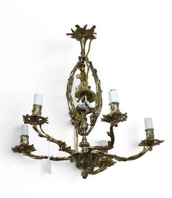 Lot 1288 - A Regency Style Six Branch Brass Light Fitting,...
