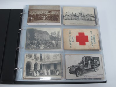 Lot 1344 - An Album of Picture Postcards and Photographs...