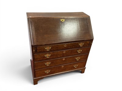 Lot 1451 - A Late XVIII Century Oak Bureau, with fall...