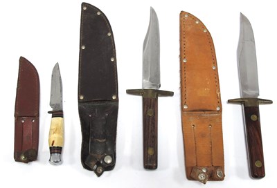 Lot 1338 - Three William Rodgers Bowie Knives, in leather...