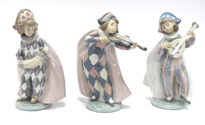 Lot 1080 - Three Lladro Porcelain Figurines, 'Harlequin...
