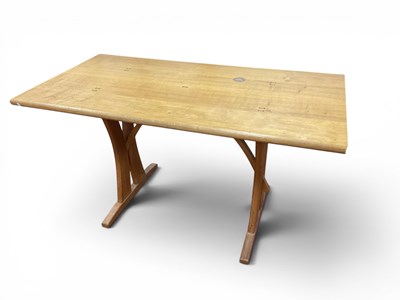 Lot 1478 - A Light Oak Rectangular Shaped Table, on...