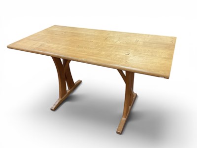Lot 1482 - A Light Oak Rectangular Shaped Table, on...