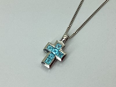 Lot 103 - An 18ct White Gold Inset Cross Pendant, on a...