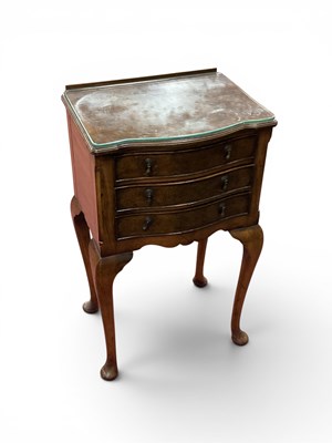 Lot 1468 - A XX Century Walnut Serpentine Shaped Bedside...
