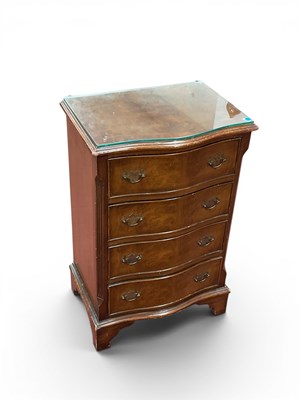 Lot 1504 - A XX Century Walnut Serpentine Shaped Chest of...