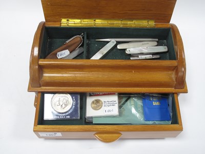 Lot 1307 - A Wooden Jewellery Box containing a quantity...