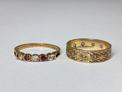 Lot 69 - A Dainty 9ct Gold Five Stone Ring, the...