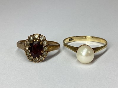 Lot 65 - A 9ct Gold Oval Cluster Ring, claw set...
