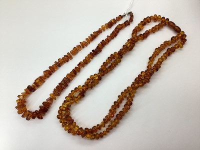 Lot 175 - A Two Strand Amber Coloured Bead Necklace, of...