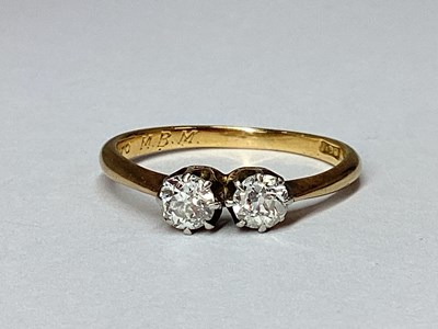 Lot 74 - A Two Stone Diamond Ring, the old cut stones...