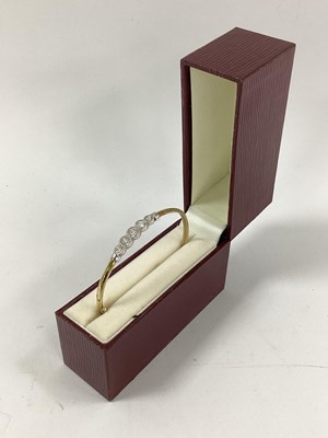 Lot 132 - A Modern Diamanté Set Bangle, rubover...