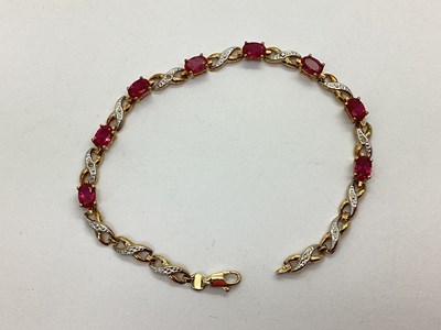 Lot 131 - A 9ct Gold Claw Set Bracelet, the oval stones...