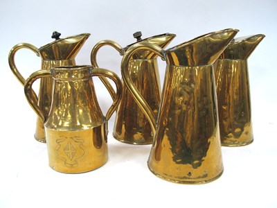 Lot 1280m - Three Late XIX Century Tapered Brass Jugs,...