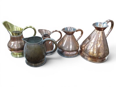 Lot 1280e - Three Graduated Copper Jugs, late XIX Century...