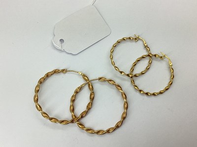 Lot 96 - Two Pairs of Hollow Twist Style Hoop Earrings,...