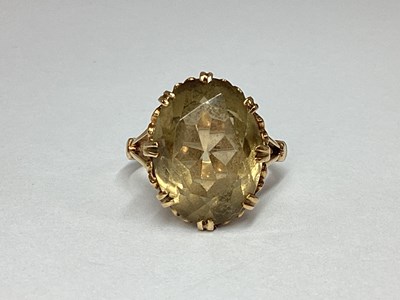 Lot 51 - A 9ct Gold Single Stone Dress Ring, oval multi...
