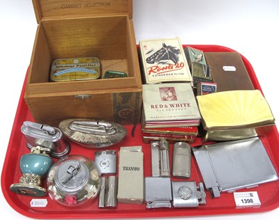Lot 1398 - Lighters and tobacco accessories, including...