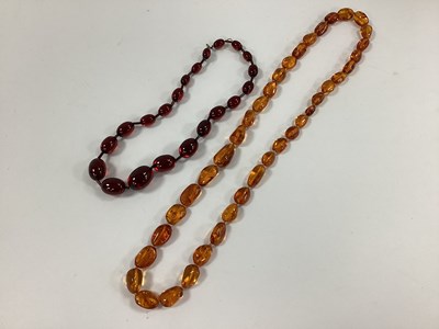 Lot 147 - An Amber Colour Single Strand Bead Necklace,...