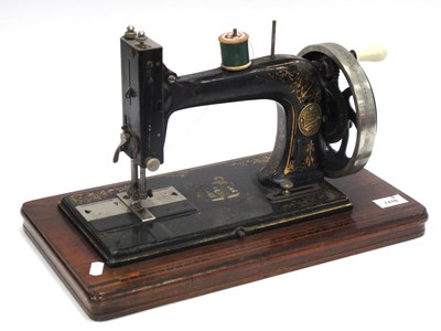 Lot 1416 - A Victorian 'Gloria' Sewing Machine.