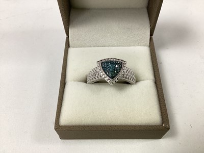 Lot 80 - A Modern Blue Diamond Dress Ring, triangular...