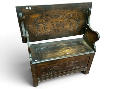 Lot 1571 - XX Century Carved Oak Monk Bench, with a fold...