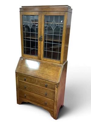 Lot 1526 - XX Century Bureau Bookcase, top with leaded...