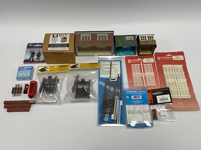 Lot 563 - A collection of 0 gauge small buildings and...
