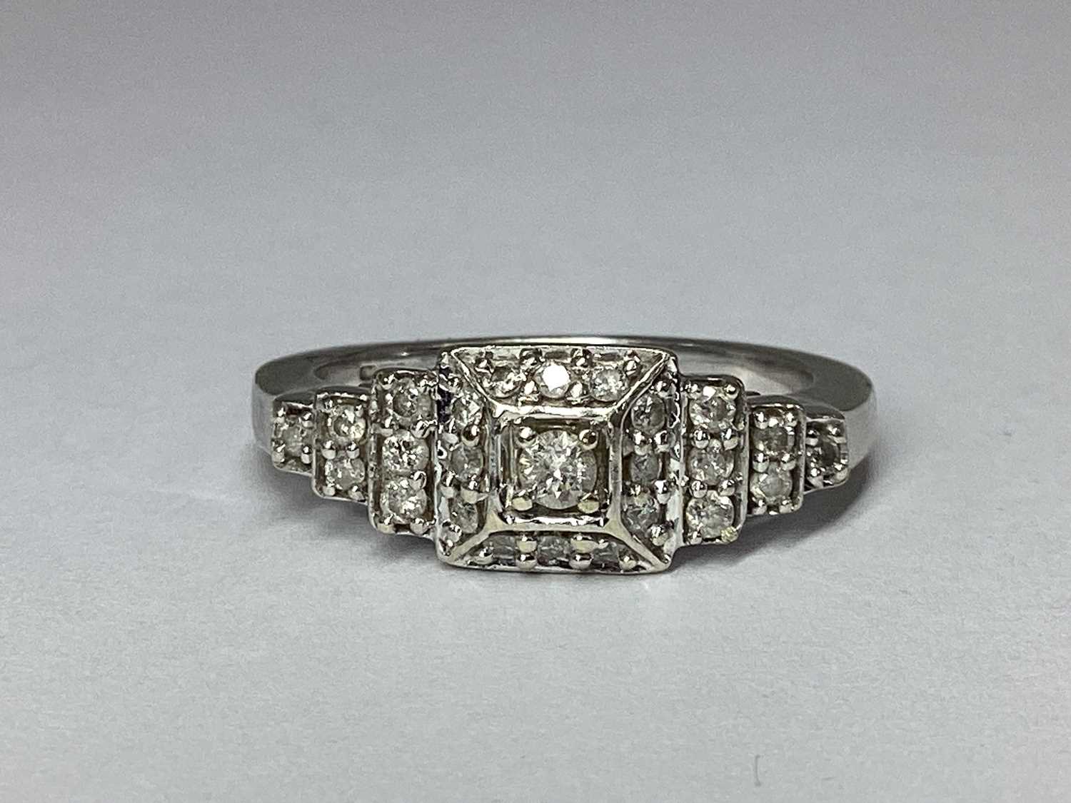 Lot 61 - A Modern 9ct White Gold Diamond Set Cluster...