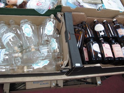Lot 1088 - Glass bottles, including a quantity of vintage-...