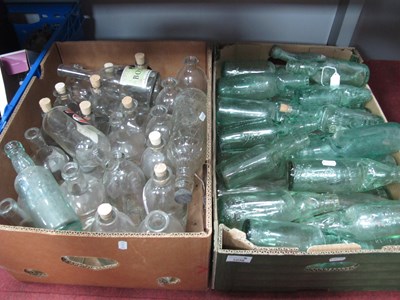 Lot 1038 - Glass bottles, in a variety of shapes and...