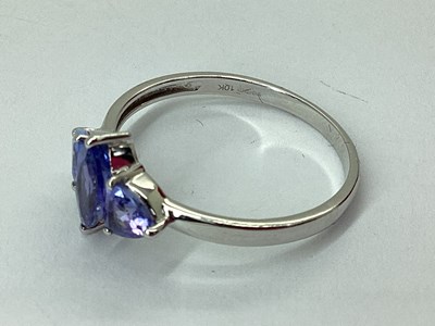 Lot 62 - A Modern 9ct White Gold Three Stone Dress Ring,...