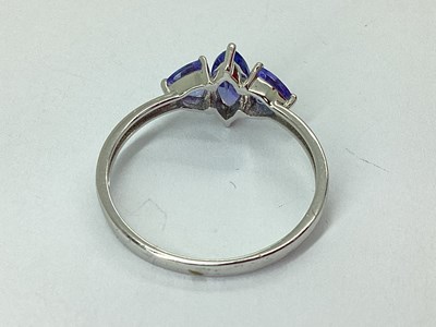 Lot 62 - A Modern 9ct White Gold Three Stone Dress Ring,...