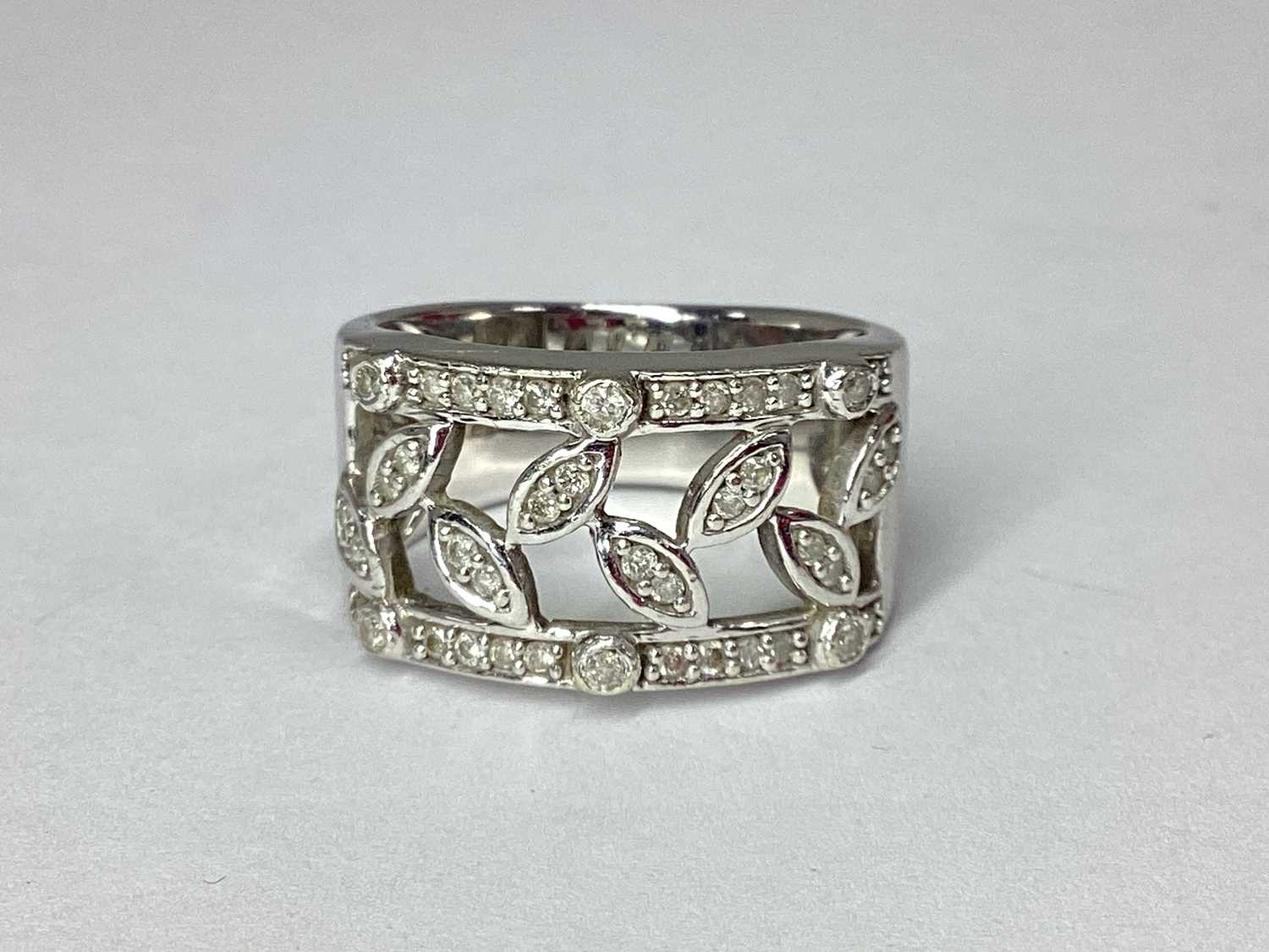 Lot 59 - A Modern 9ct White Gold Inset Band, of...