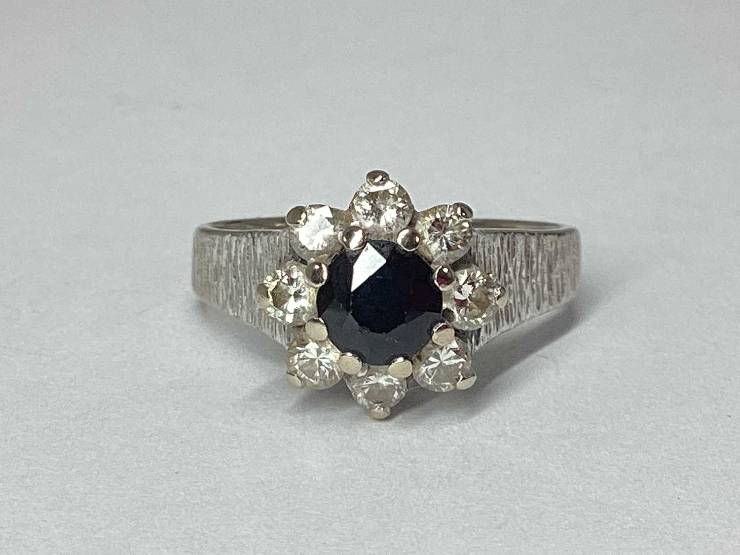 Lot 57 - A High Set Cluster Ring, of flowerhead design,...