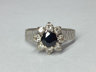 Lot 57 - A High Set Cluster Ring, of flowerhead design,...