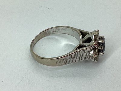Lot 57 - A High Set Cluster Ring, of flowerhead design,...