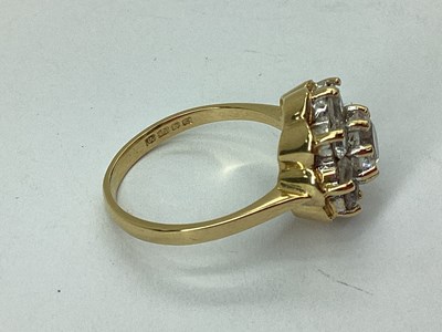 Lot 43 - An 18ct Gold Cluster Ring, of flowerhead...