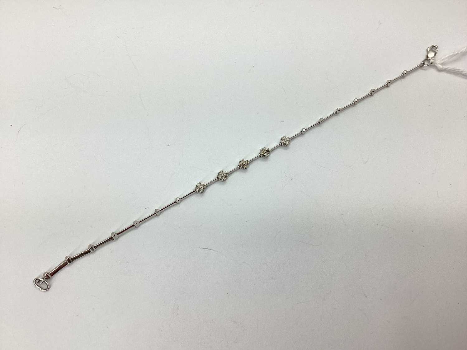 Lot 80 - A Dainty Stone Set Bracelet, cluster claw set...