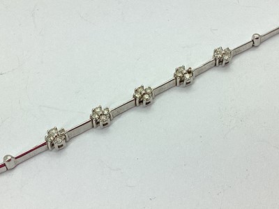 Lot 80 - A Dainty Stone Set Bracelet, cluster claw set...