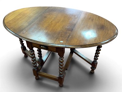 Lot 1549 - Oak Oval Topped Drop Leaf Dining Table, circa...