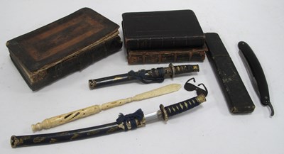 Lot 1300 - Bone Stonhope 21.5cm long, two miniature...