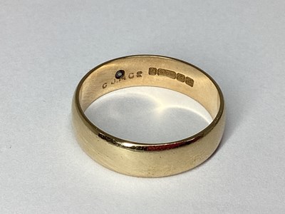 Lot 56 - A 9ct Gold Band, with single star set...